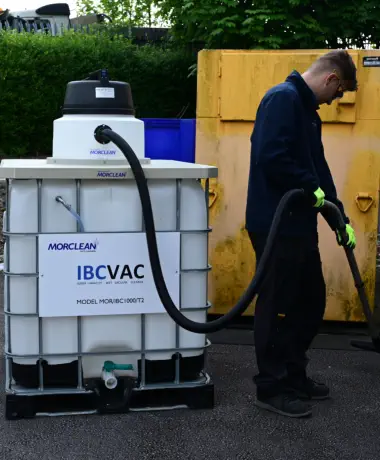 Using the IBC Vac to draw up a spillage in an industrial yard